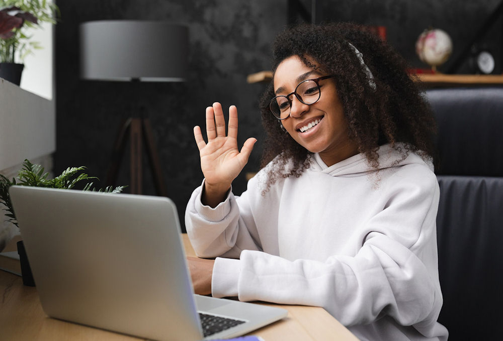 patient waving during telehealth